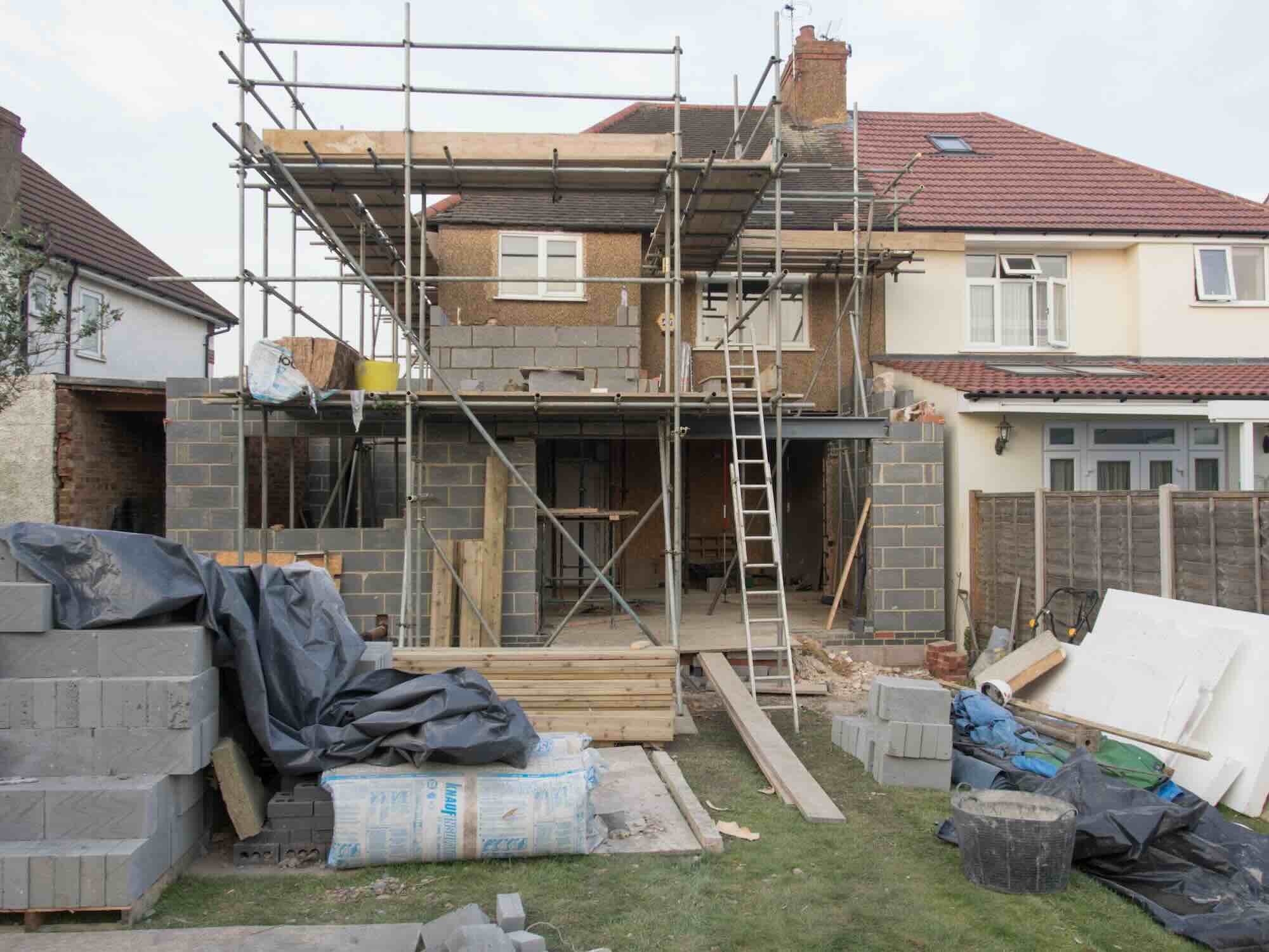 Residential Two-Story Extension Progress with Party Wall Considerations in Hertfordshire